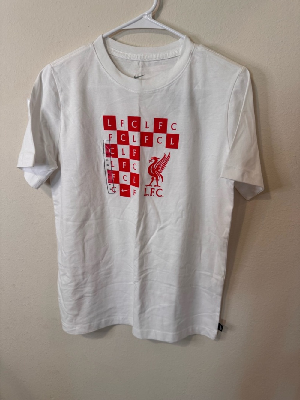Nike White Tee with Red Crest Graphic